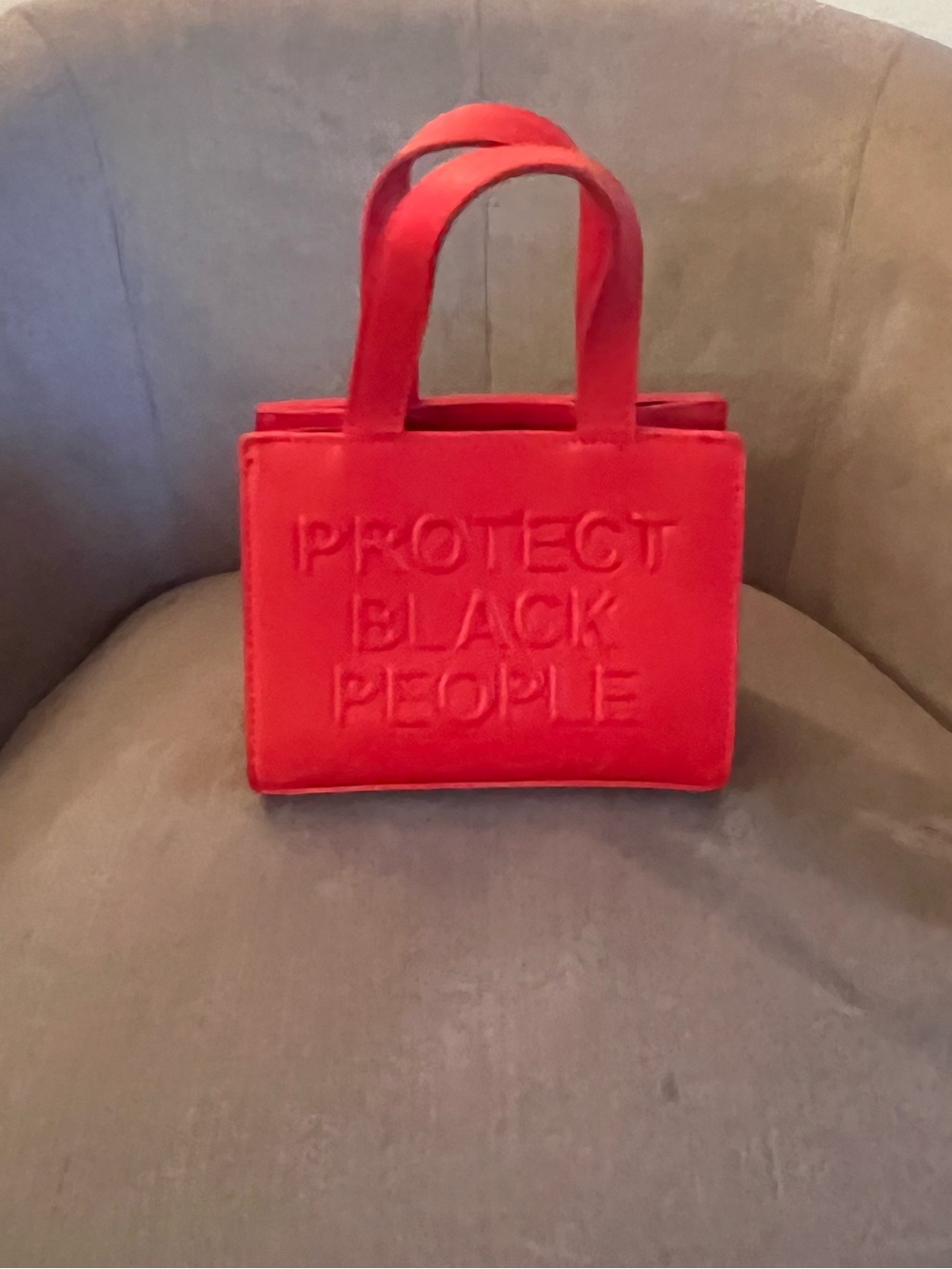 CISE Red Statement Mini Tote Bag with Embossed 'PROTECT BLACK PEOPLE'